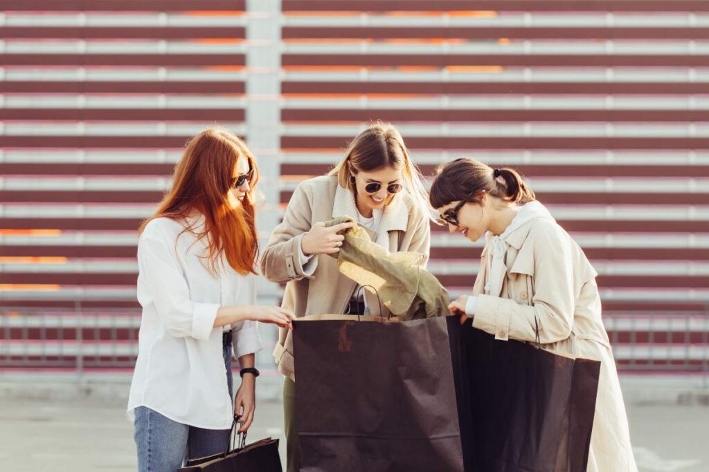 Happy customers shopping in a well-organized sports retail store with quality sporting goods, outdoor equipment, athletic apparel, and friendly customer service.